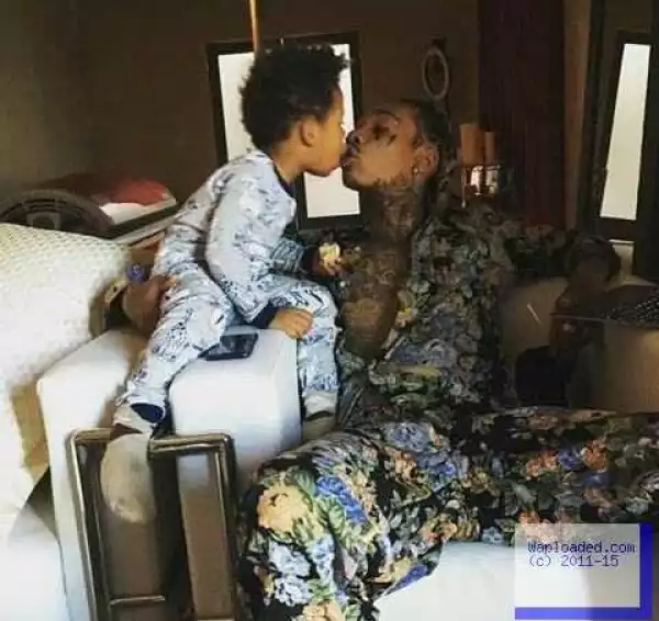 People are critisizing this photo of Wiz Khalifa kissing his son